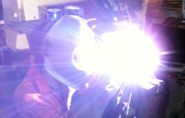 me welding the hand causing a very bright white light that washes out the photo